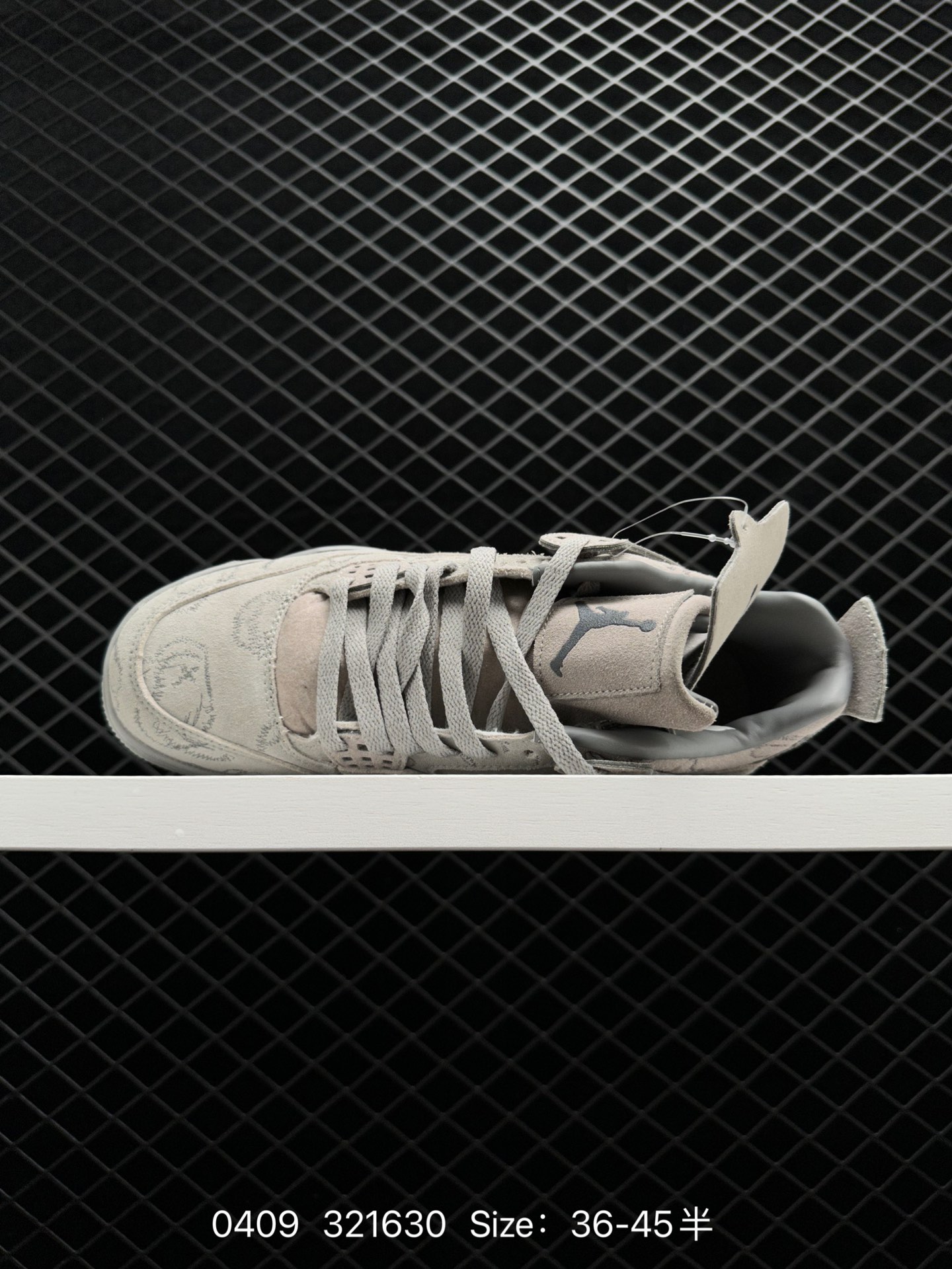 KAWS x Air Jordan 4 “Cool Grey”